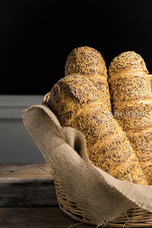 Freshly baked bread on wooden table